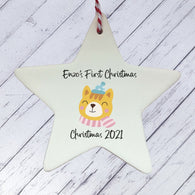 a ceramic star ornament with a dog on it