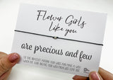 a person holding a card that says flower girls like you are precious and flow