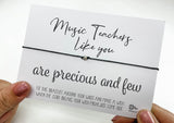 a hand holding a card that says music teachers like you are precious and flow