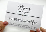 a person holding a card with a message on it