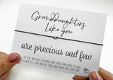 a hand holding a card that says granddaughters like you are precious and few
