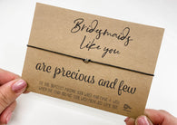 a hand holding a card that says, bridesmaid like you are precious and