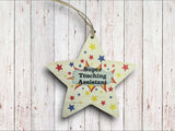 a wooden star ornament with the words super teaching assistant on it