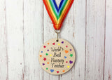 World's Best Nursery Teacher printed wooden medal