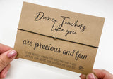 a hand holding a card that says dance teacher's like you are precious and