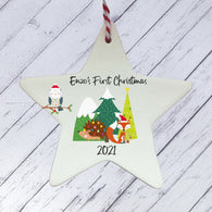 a ceramic star ornament with a christmas scene on it