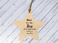 a wooden star ornament with a poem on it