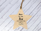 a wooden star ornament with a poem on it