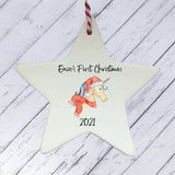 a ceramic star ornament with a unicorn on it